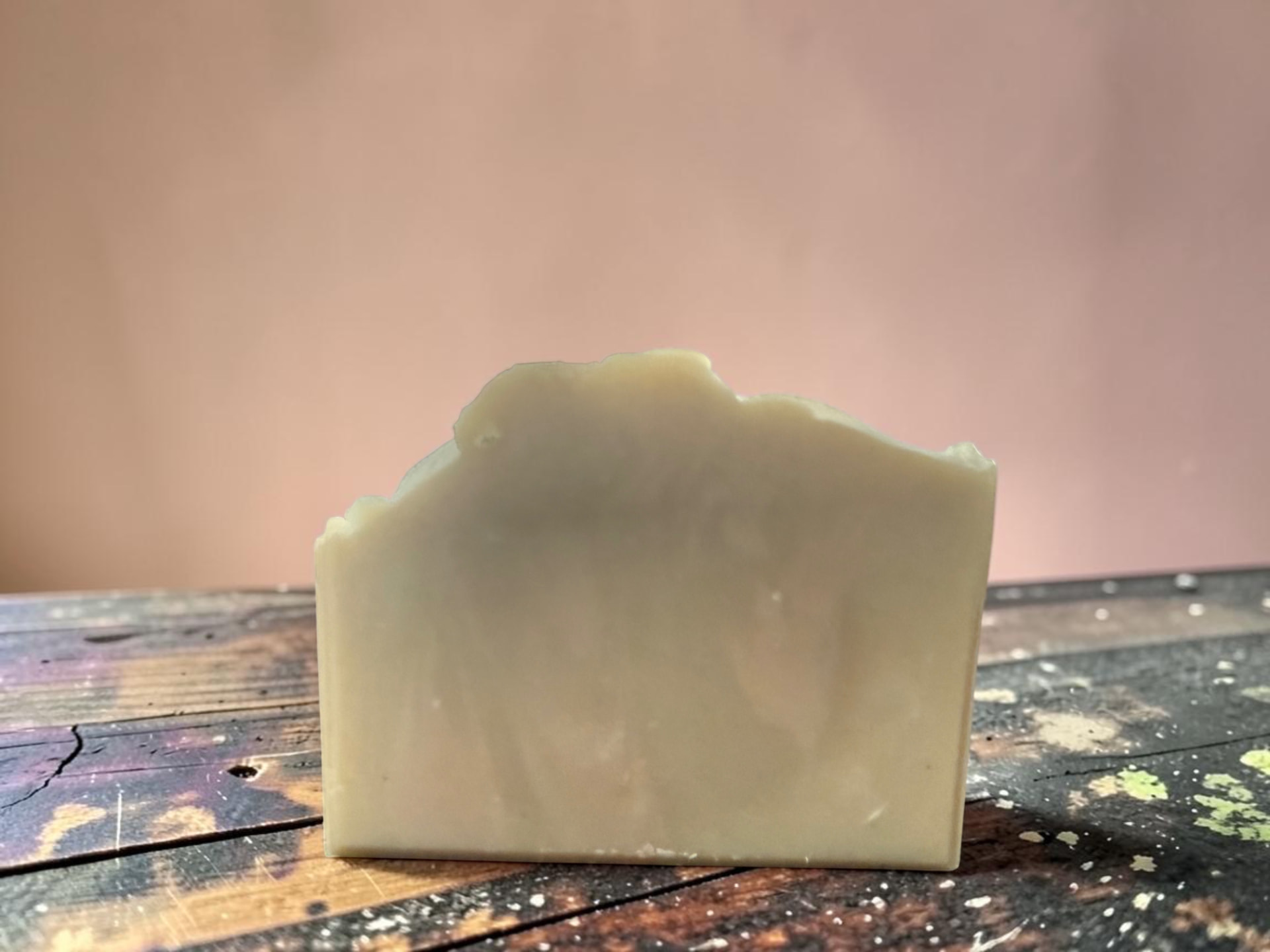 Coastal Cottage Soap, a green and white handmade bar on a light surface